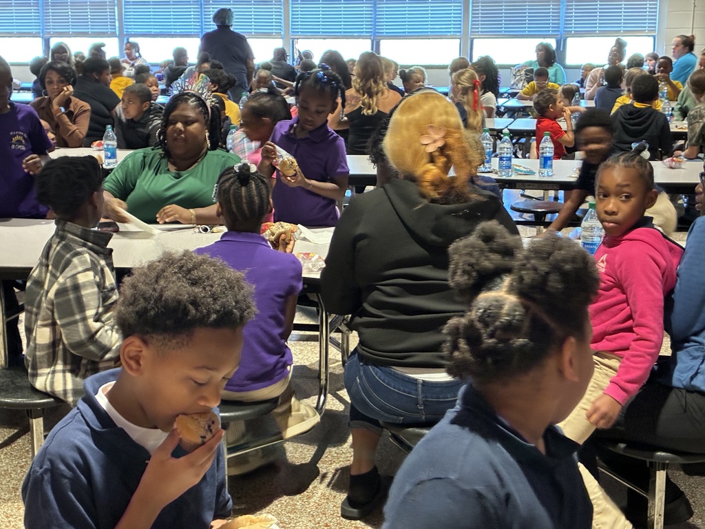 Students at Cook Elementary enjoy "Muffins with Mom" on Friday morning. 