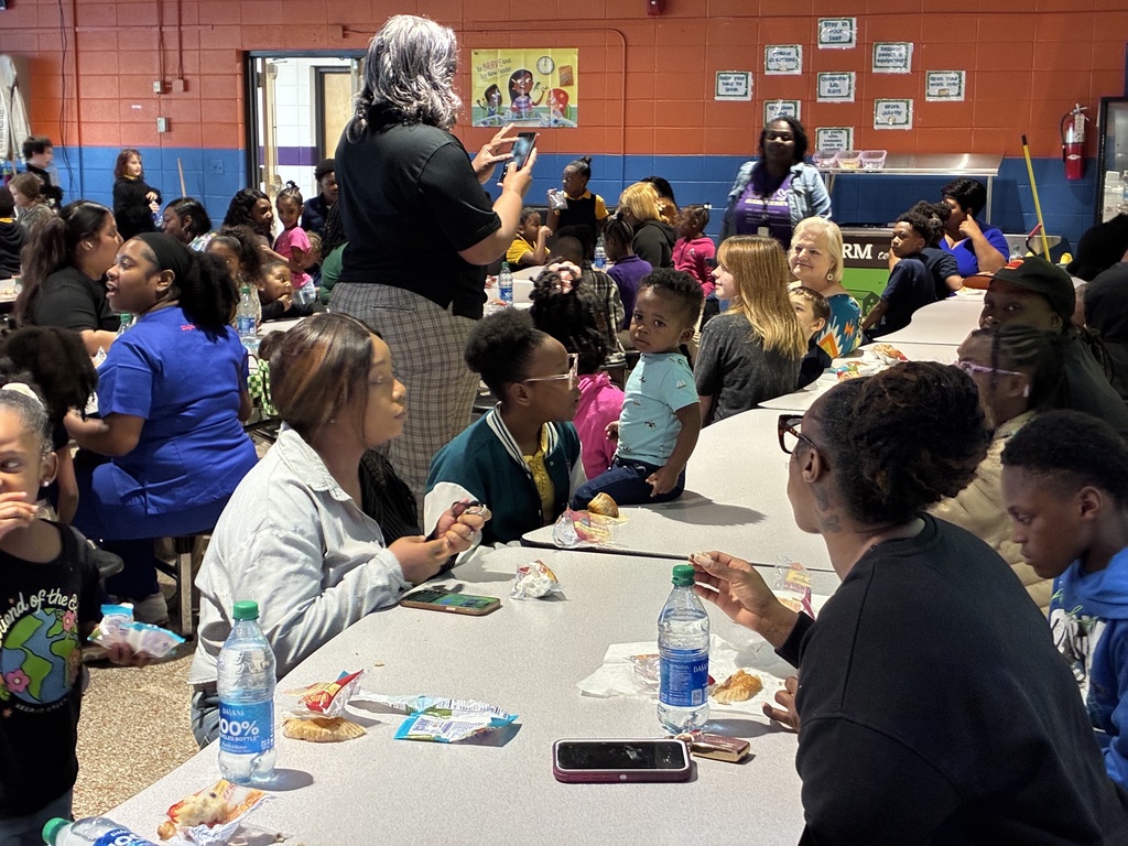 Students at Cook Elementary enjoy "Muffins with Mom" on Friday morning. 