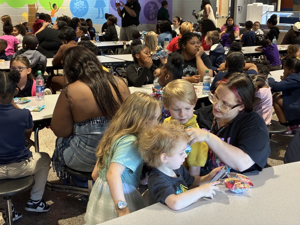 Students at Cook Elementary enjoy "Muffins with Mom" on Friday morning. 