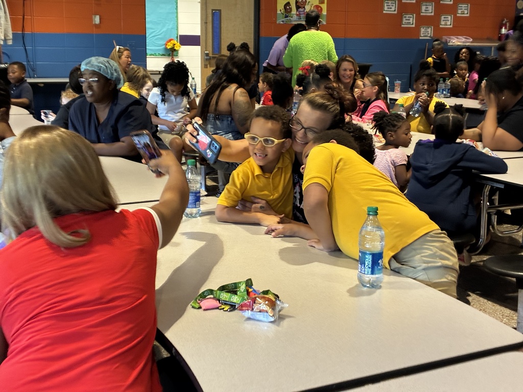 Students at Cook Elementary enjoy "Muffins with Mom" on Friday morning. 