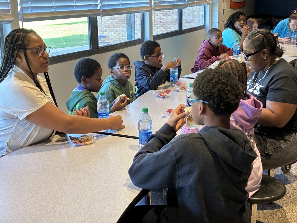 Students at Cook Elementary enjoy "Muffins with Mom" on Friday morning. 