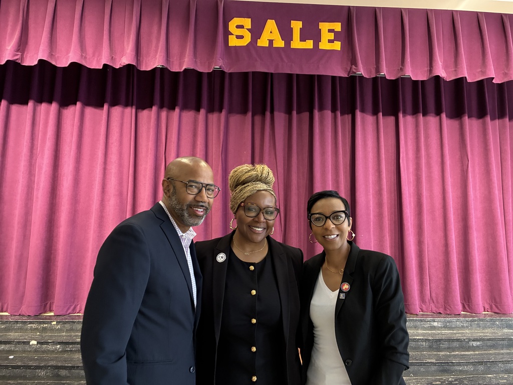 Mayor Stephen Jones and his wife, Stephanie, pose for a picture with Sale Elementary Principal Dr. Shanika McKinney
