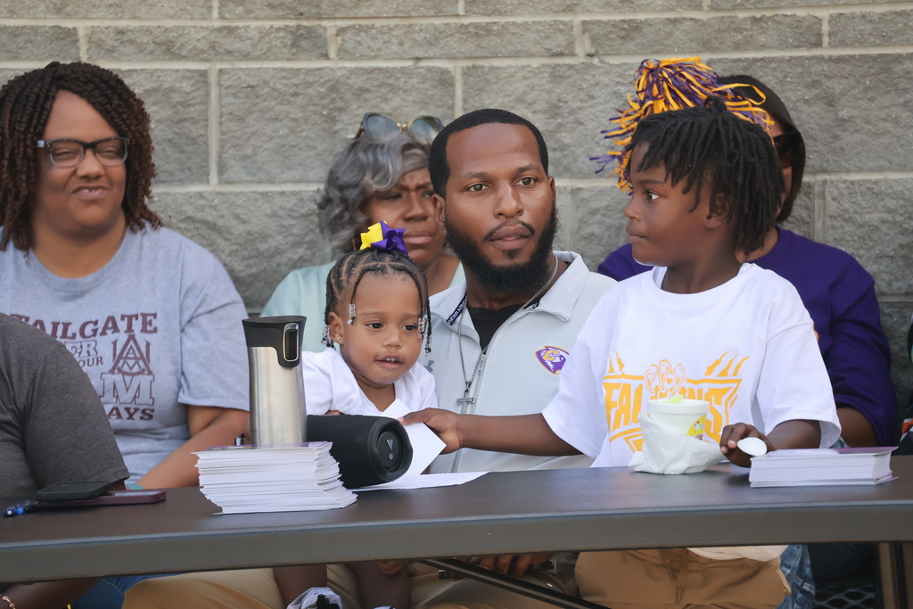 Coach Morgan and his kids at the "Meet the Coach" event.