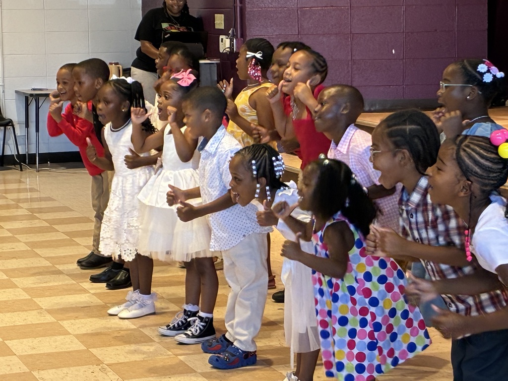 Fairview Elementary Kindergartners perform a song at their graduation.