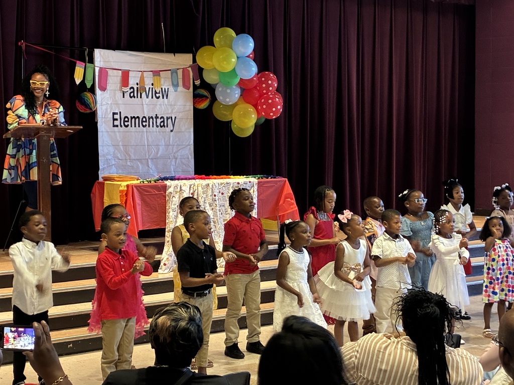 Fairview Elementary Kindergartners perform a song at their graduation.