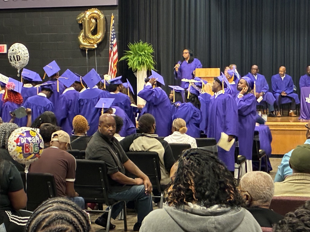 Columbus Middle School hosted its 8th grade graduation ceremony on Friday afternoon. Students stand to go on stage.