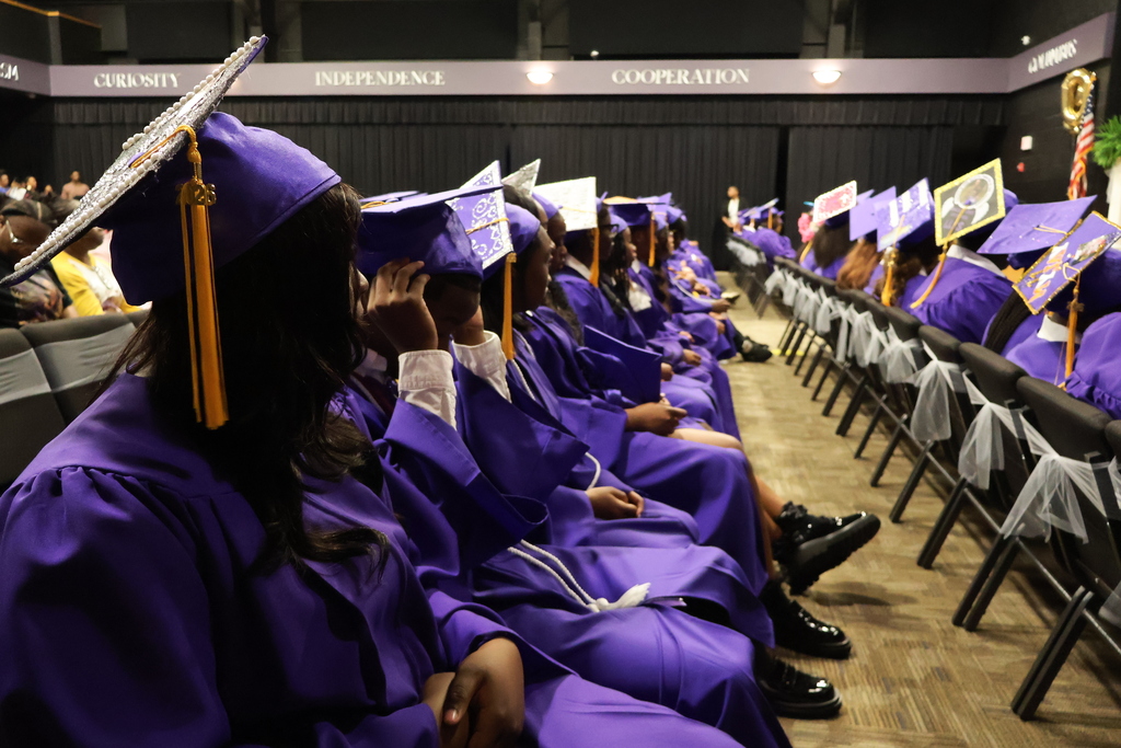 Columbus Middle School hosted its 8th grade graduation ceremony on Friday afternoon. Students sit and wait for their name to be called. 