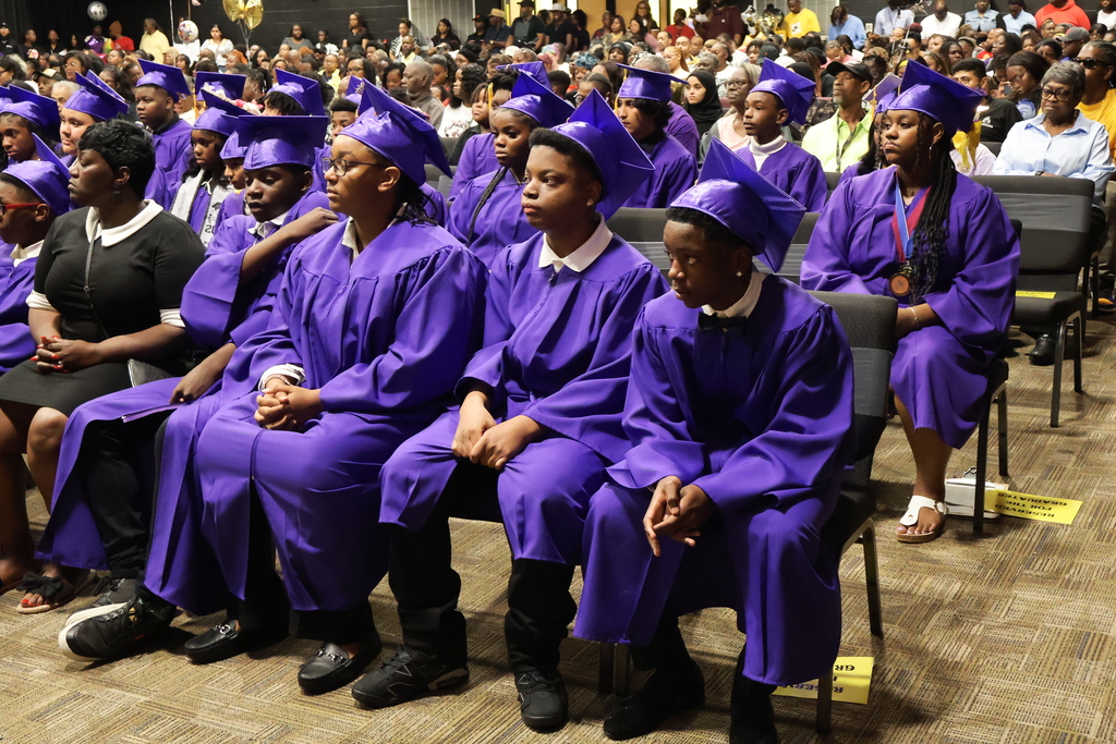 Columbus Middle School hosted its 8th grade graduation ceremony on Friday afternoon. Students sit and wait for their name to be called. 