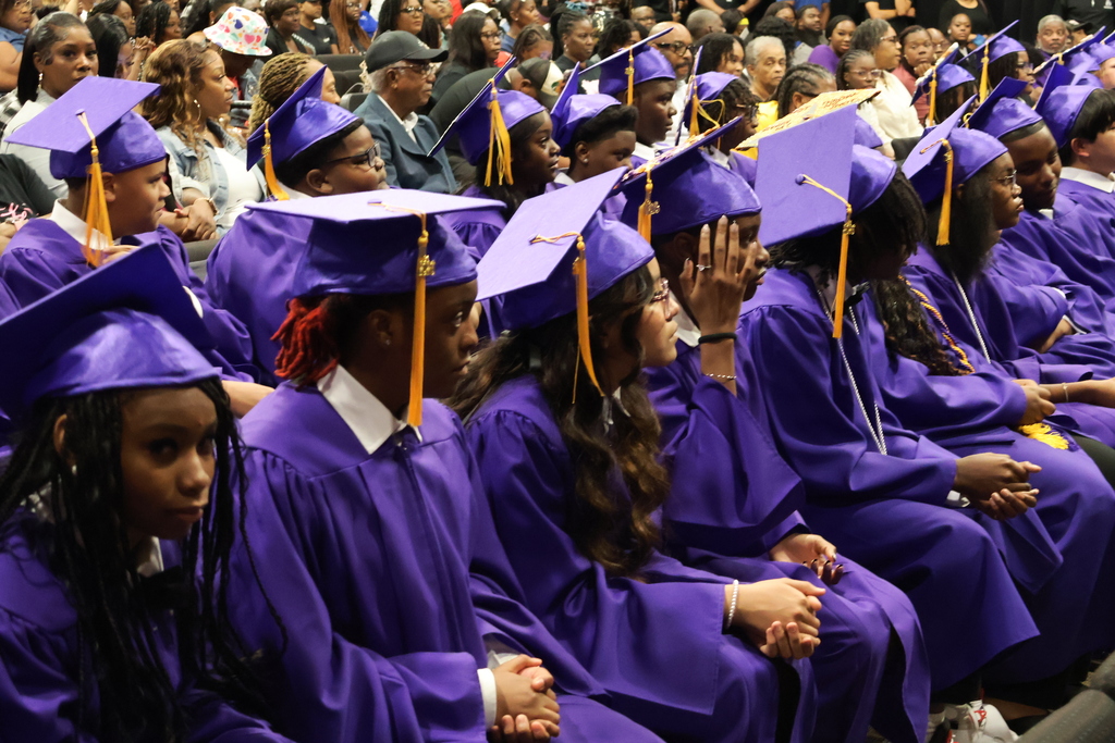 Columbus Middle School hosted its 8th grade graduation ceremony on Friday afternoon. Students sit and wait for their name to be called. 