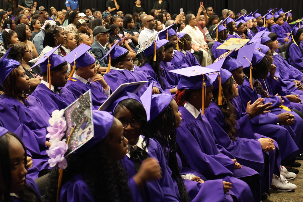 Columbus Middle School hosted its 8th grade graduation ceremony on Friday afternoon. Students sit and wait for their name to be called. 