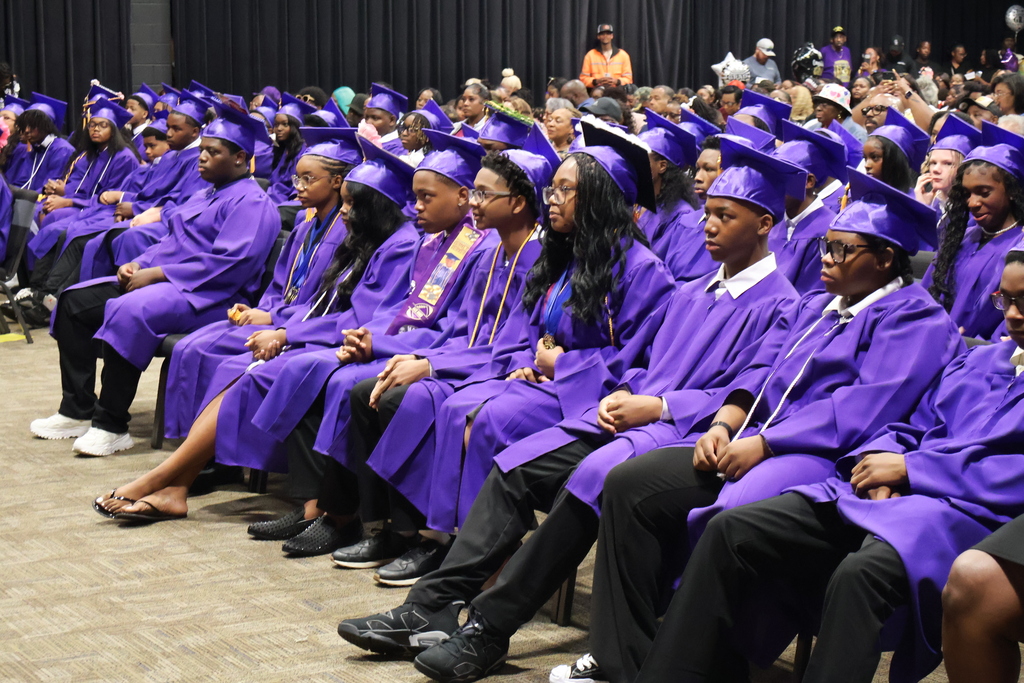 Columbus Middle School hosted its 8th grade graduation ceremony on Friday afternoon. Students sit and wait for their name to be called. 