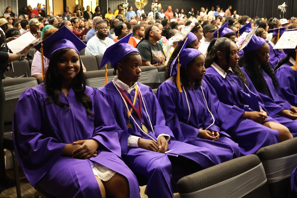 Columbus Middle School hosted its 8th grade graduation ceremony on Friday afternoon. Students sit and wait for their name to be called. 