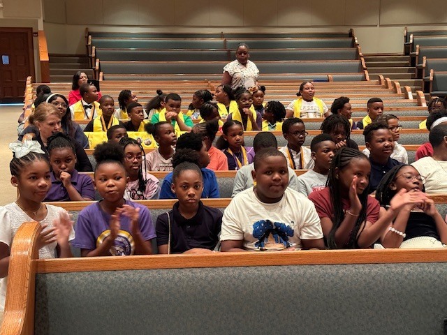 Students cheer on their classmates at Fairview Elementary's  Awards Day Ceremony on Wednesday morning.