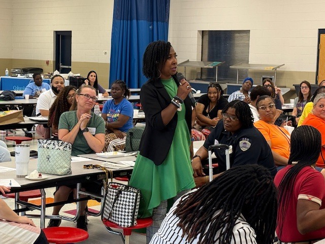 Teachers introduce themselves at to other educators at Stokes-Beard Elementary. 