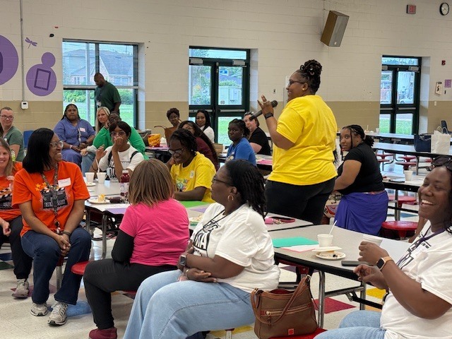 Teachers introduce themselves at to other educators at Stokes-Beard Elementary. 