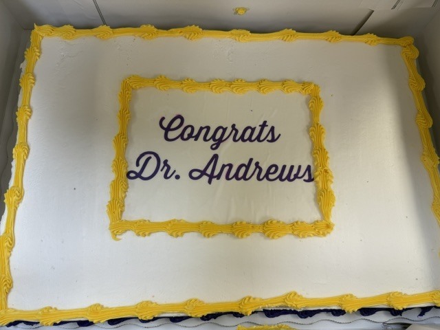 A cake to congratulate Dr. Andrews on his appointment as Assistant Superintendent. 