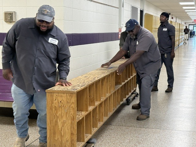 CMSD maintenance crews moving furniture at Cook Elementary. 