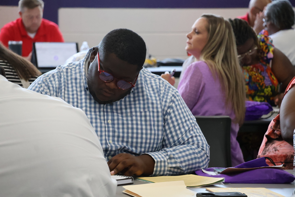 New CMSD employees fill out paperwork at the new employee orientation held at Brandon Central Services Center on Friday morning. 