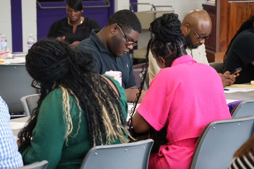 New CMSD employees participate in the new employee orientation held at Brandon Central Services Center on Friday morning. 