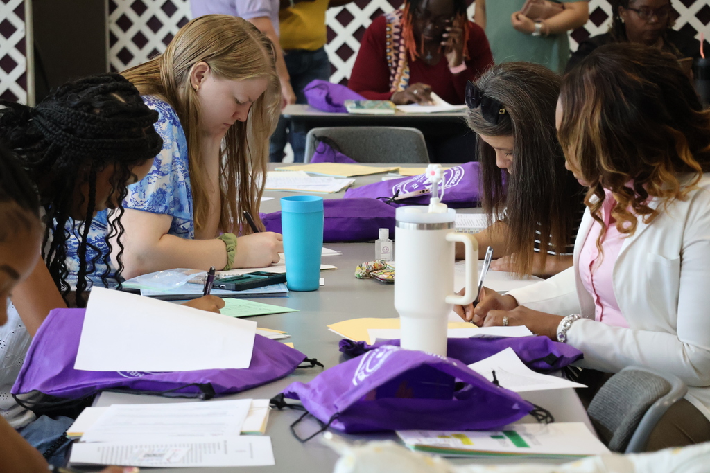 New CMSD employees fill out paperwork at the new employee orientation held at Brandon Central Services Center on Friday morning. 