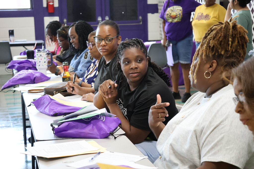 New CMSD employees talk with each other at the new employee orientation held at Brandon Central Services Center on Friday morning. 