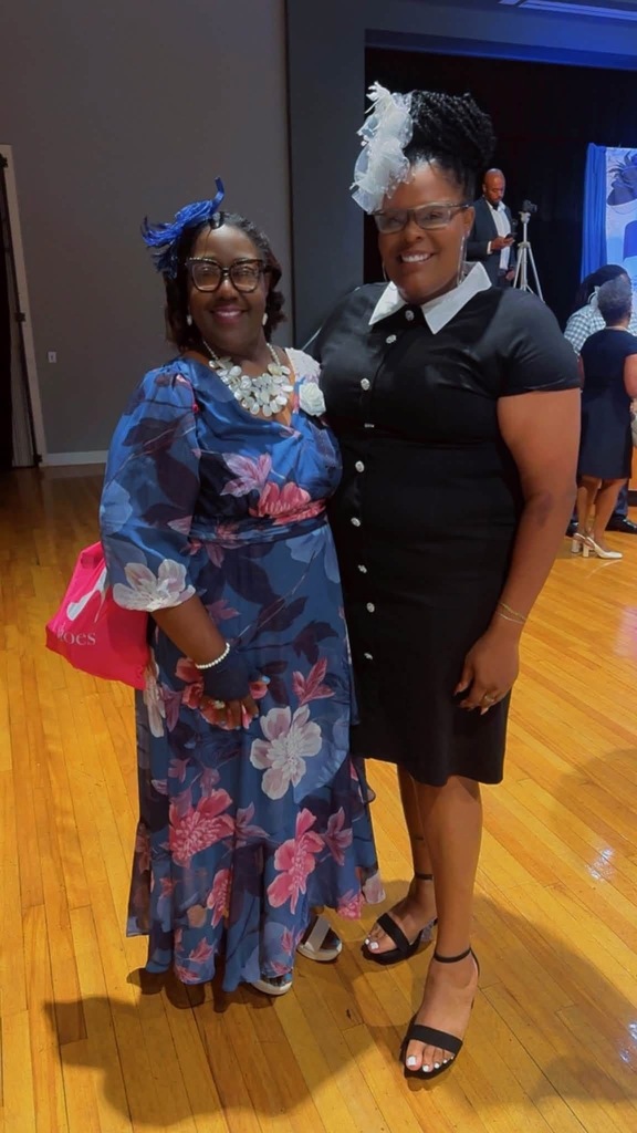 CMSD employees pose for a picture at the "First Mother's Tea" in Columbus.