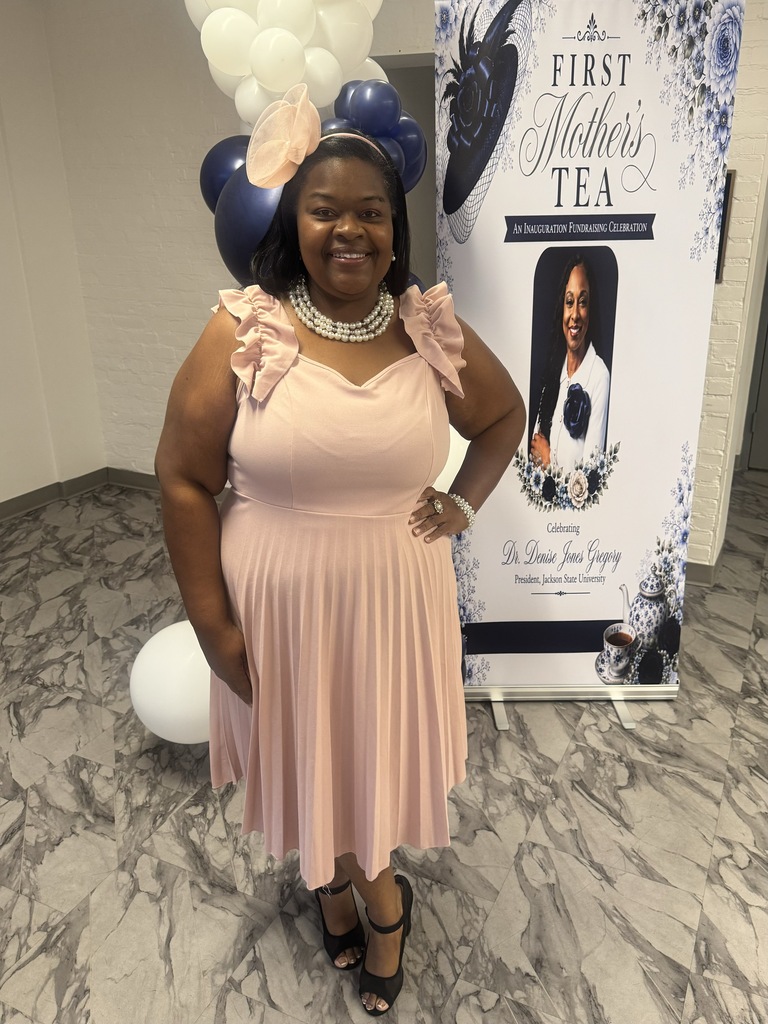 CMSD employees pose for a picture at the "First Mother's Tea" in Columbus.