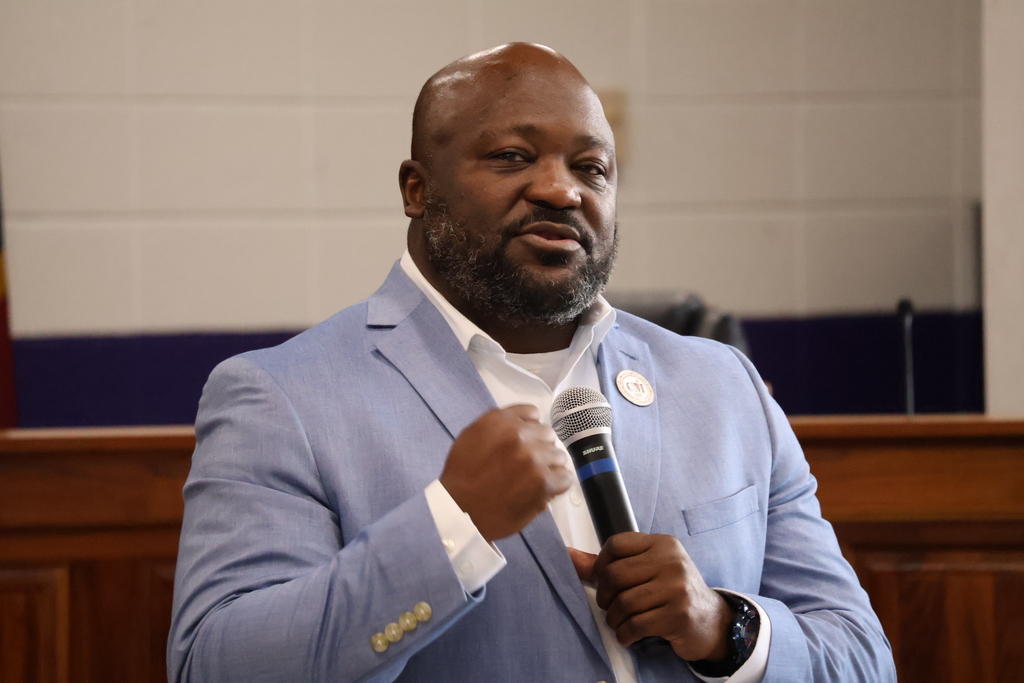 Dr. Chapman speaks at the Superintendent's Roundtable. 