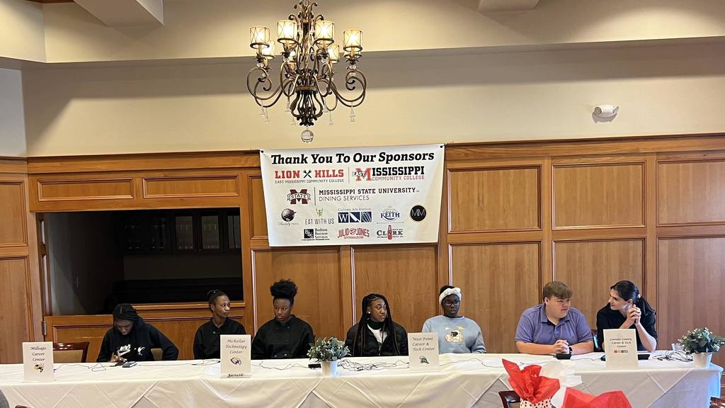 Row of students compete in the knowledge bowl