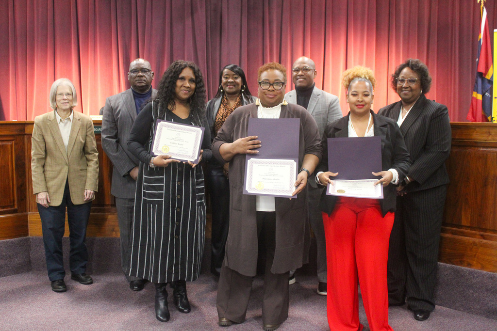 Board celebrates staff