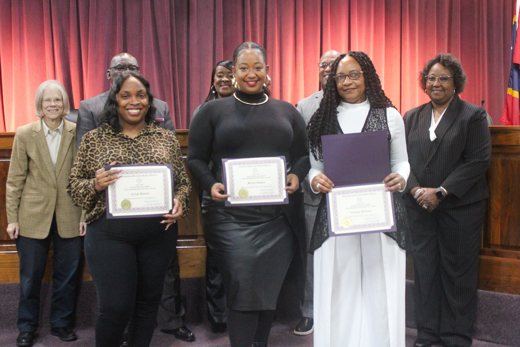 Board celebrates staff