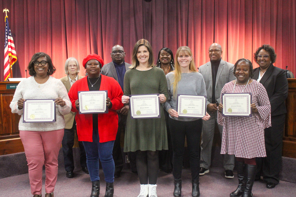 Board celebrates staff