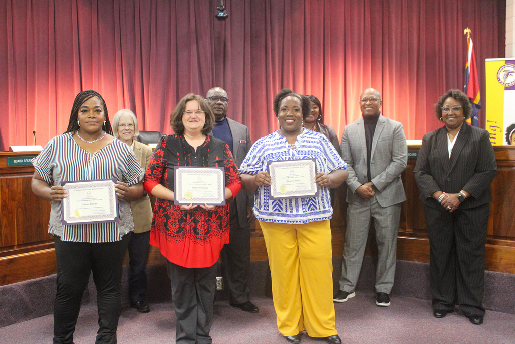 Board celebrates staff