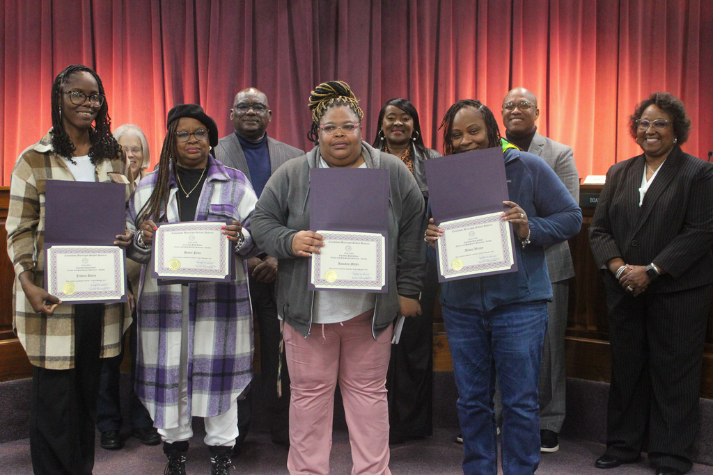 Board celebrates staff
