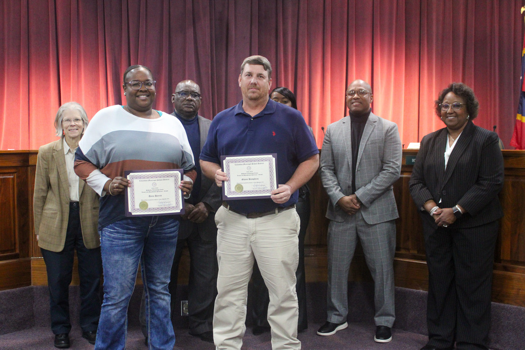 Board celebrates staff