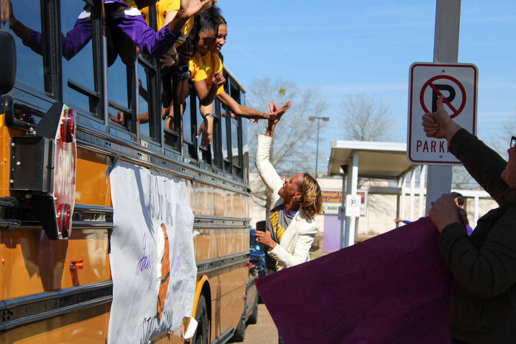 Dr. Labat celebrates the Lady Falcons basketball team as they head to the State Championship