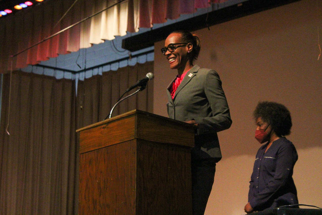 Dr. Labat speaking at an author event at Cook Elementary