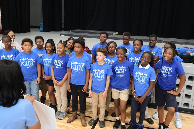 Hunt students are presented a check to help with physical education