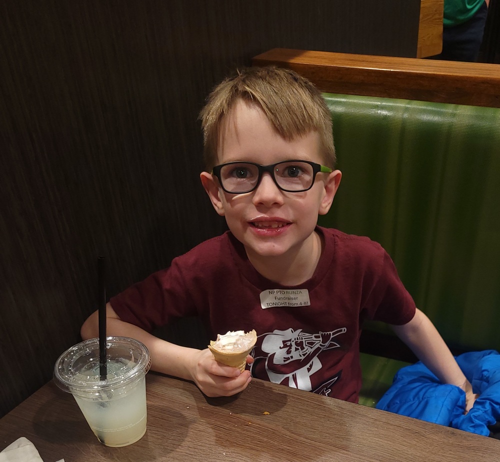 Boy eating ice cream cone