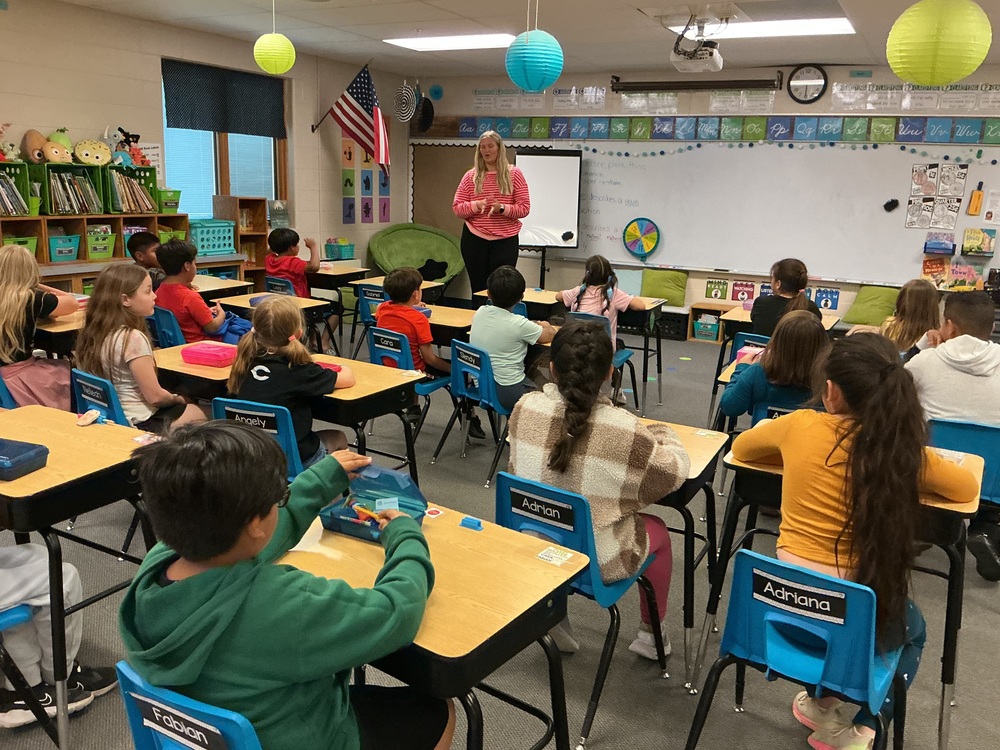 Children listening to teacher