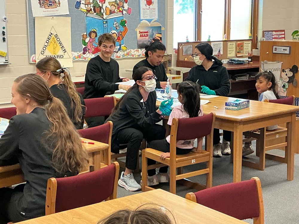 Dental students with kids
