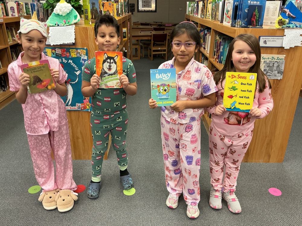 Kids in Pjs with books