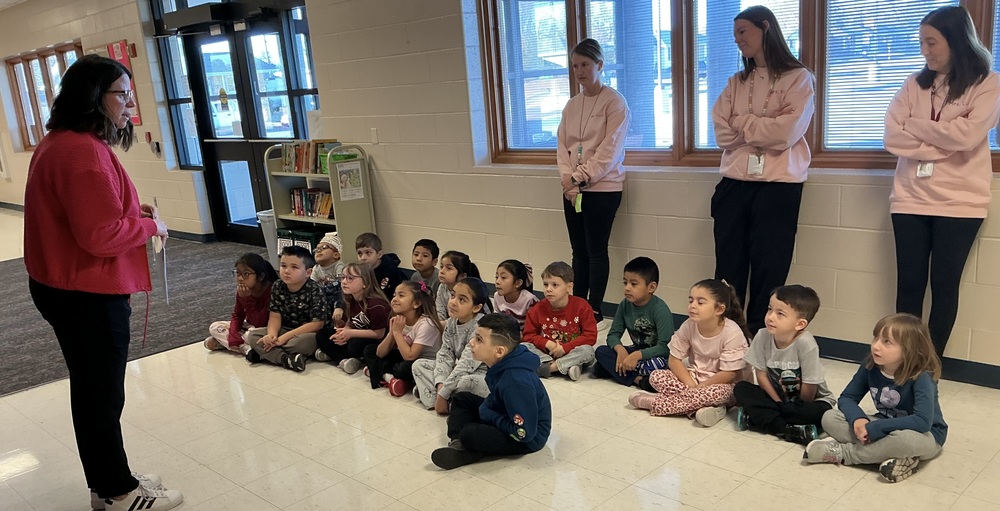 Students listening to teacher