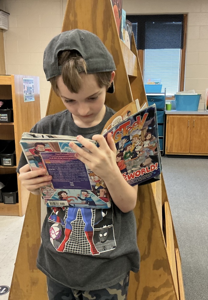 Kids in hats with books