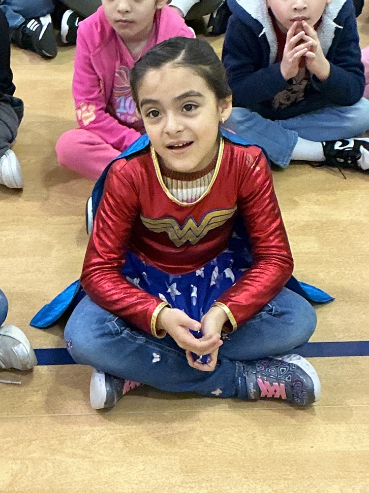 Child dressed as superhero