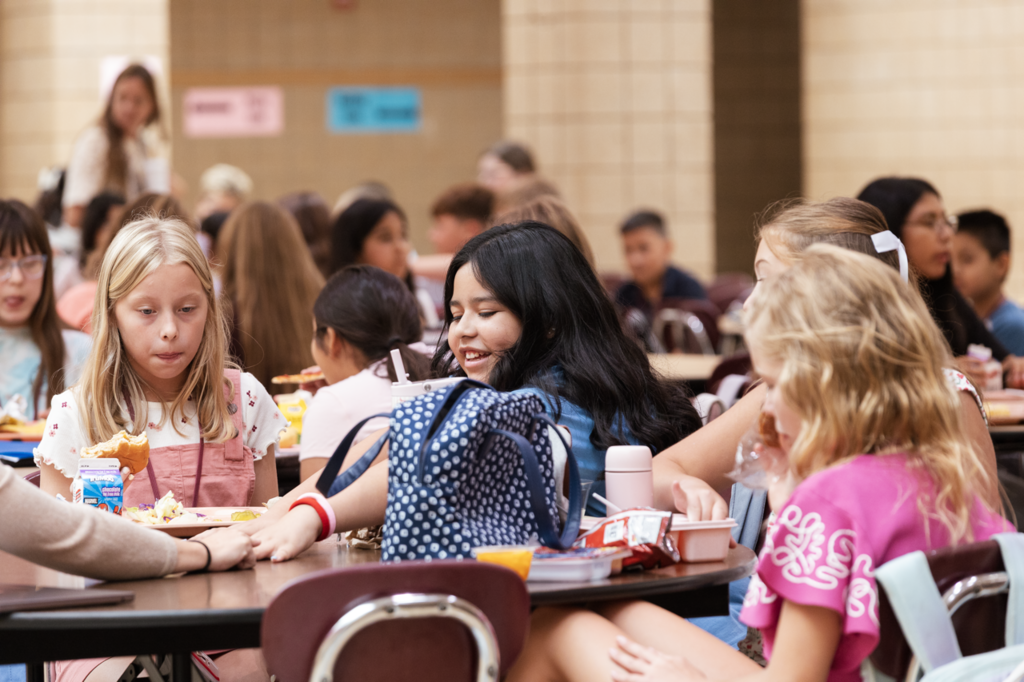 A group of CMS 5th-grade girls eat lunch during their first day of school.