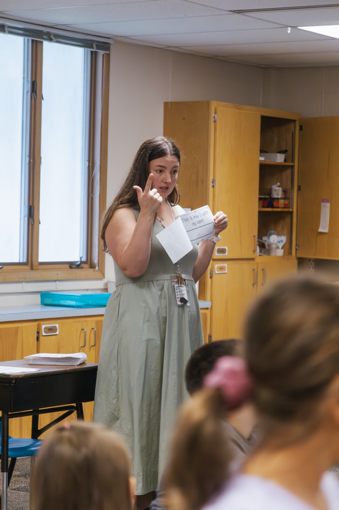 West Park second-grade teacher Ms. Grossnicklaus answers her students' questions regarding their autobiographies.