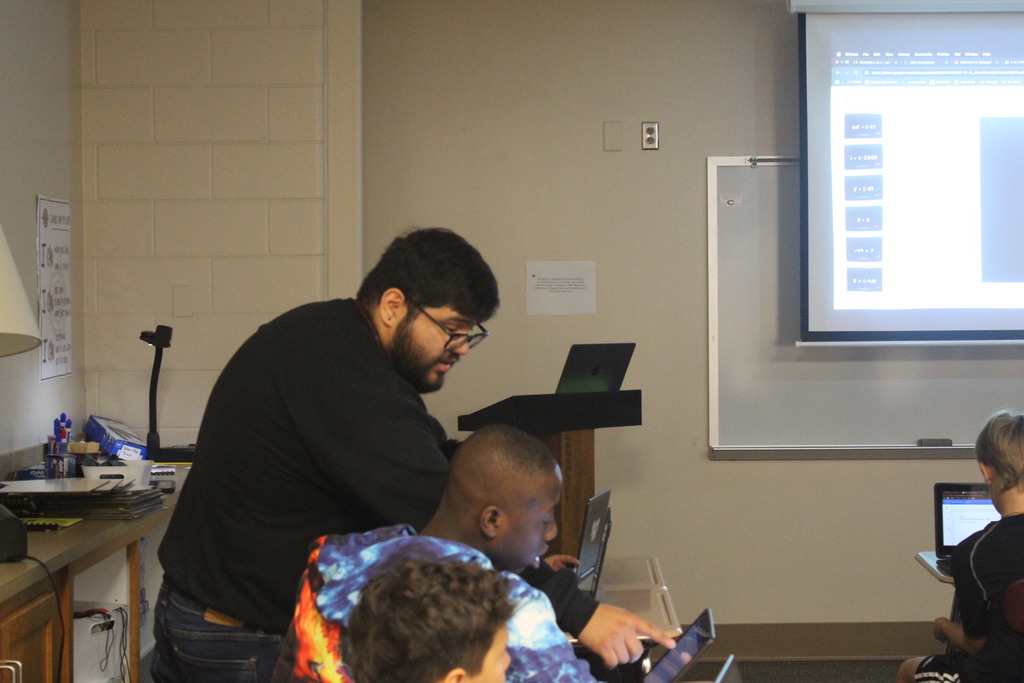 Mr.Zacarias is teaching his students 