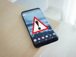 cell phone showing an emergency icon/issue icon