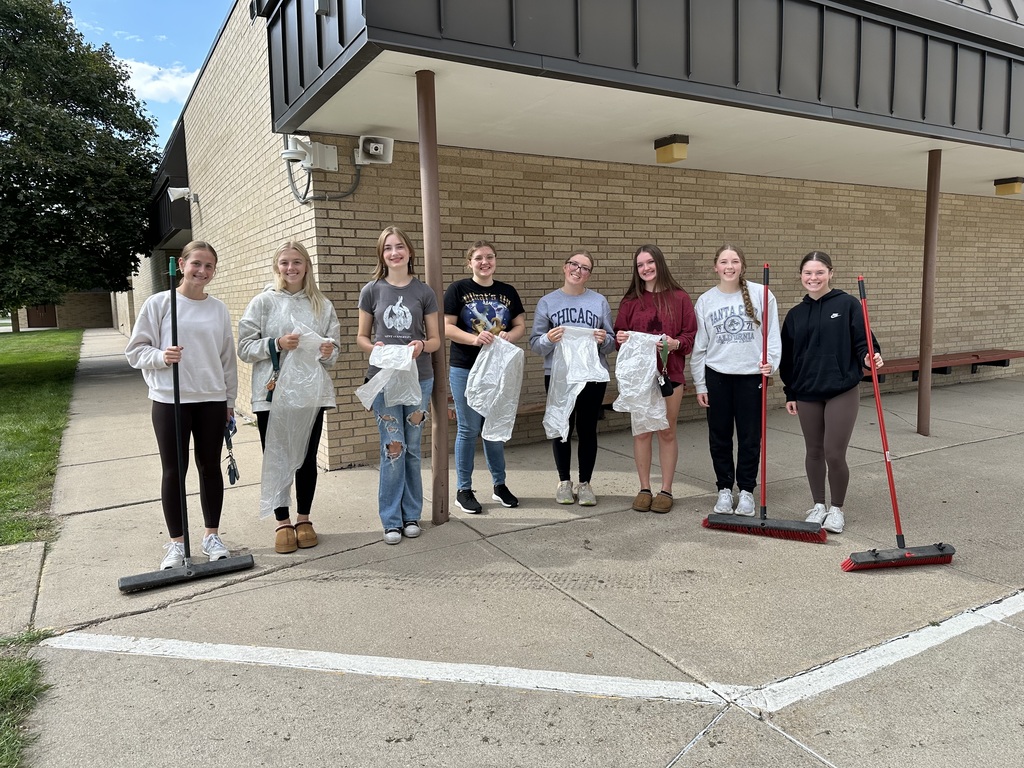 Columbus HIgh School National Honor Society members pose for a photo as they get ready to clean up the LC playground.